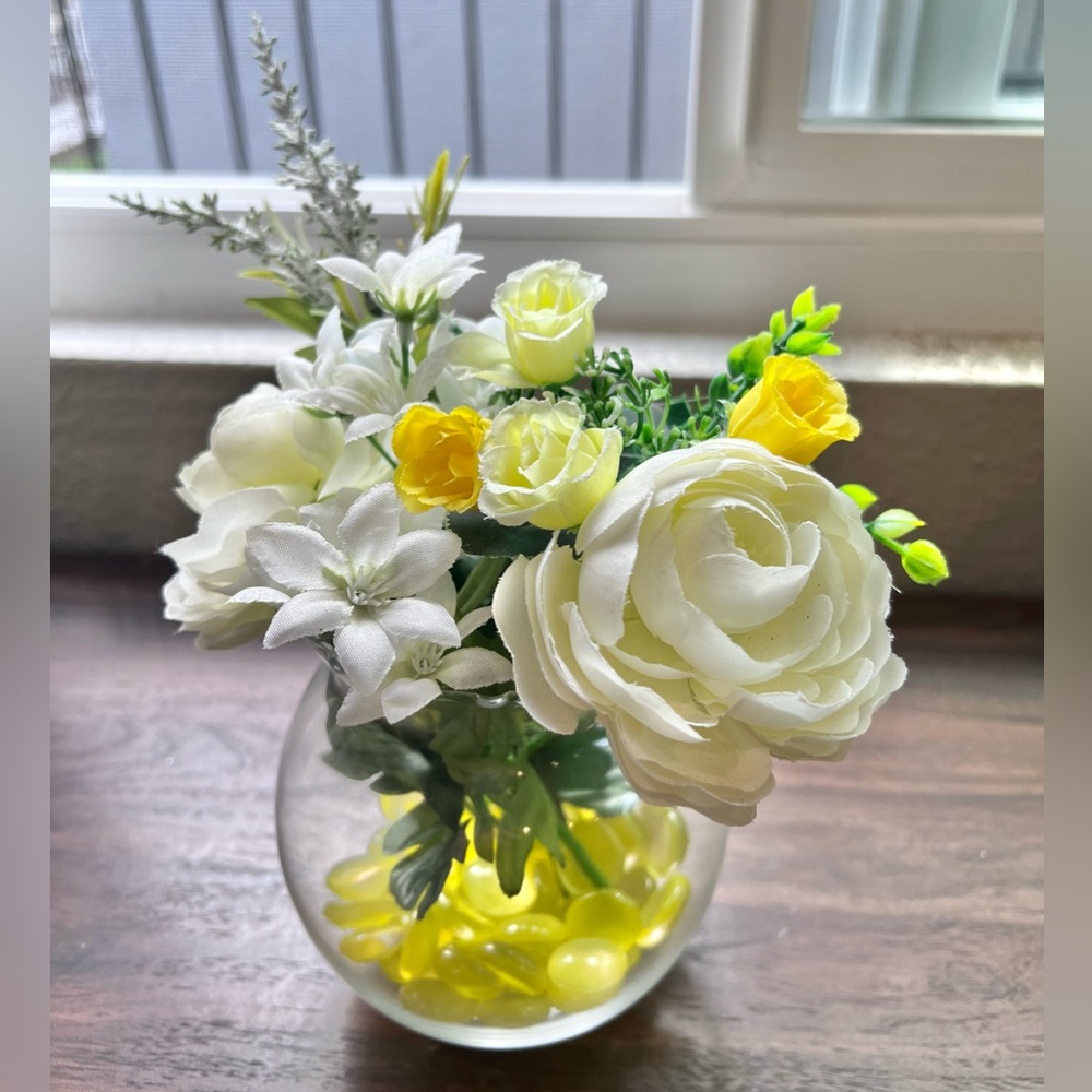 Faux flowers white and yellow in vase
